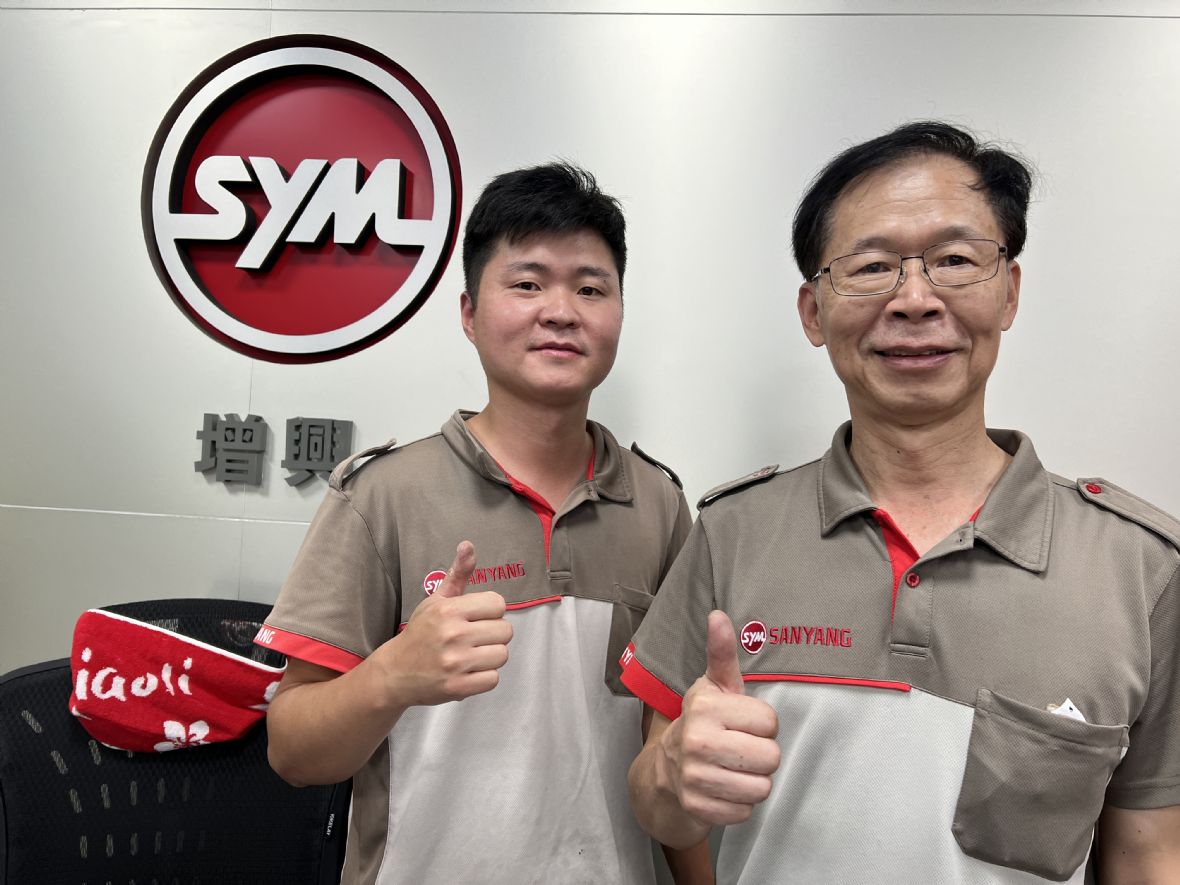 7. 增興機車行章文忠父子。